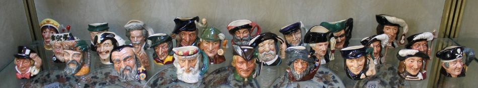 A large quantity of Royal Doulton miniature character jugs including `Long John Silver` (D6512), `