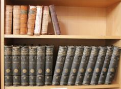 [BOOKS] - a quantity of mainly hardback, leatherbound books held on two shelves to include six