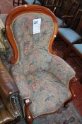 A Victorian mahogany button back upholstered armchair bearing brass presentation plaque