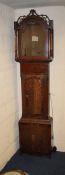 An oak and crossbanded long case clock with pierced fretwork hood,  (lacking dial)