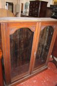 A late Victorian mahogany display cabinet enclosing shelves 131cm high, 116cm  Best Bid