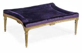 A giltwood and purple velvet upholstered stool, in Regency style, with concave sides, above a