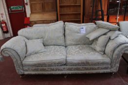 A modern three seater leaf decorated damask upholstered sofa 240cm length