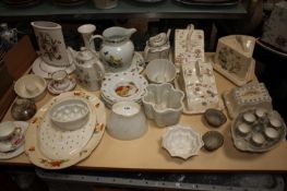 Mixed ceramic jelly moulds, Royal Worcester `Worcester Herbs` jug, a Portmeirion `Botanical Garden`