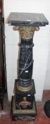 A variegated marble torchere, modelled as a Corinthian column 120cm high