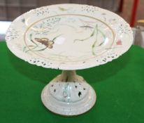 A 19th Century glazed parian Royal Worcester part dessert service decorated with insects and