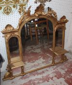 A Victorian style gilt overmantle mirror 110cm high, 120cm wide