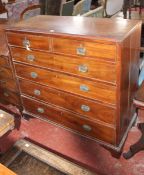 An early Victorian mahogany chest with two short and four long graduated drawers on bracket feet