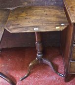 A George III mahogany tilt top table Best Bid