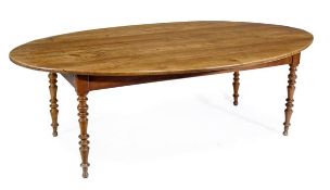 A cherry wood dropleaf dining table, second quarter 19th century, possibly French, the oval top