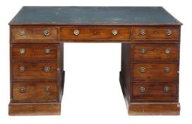 A George IV mahogany partnersÕ pedestal desk, circa 1825, the rectangular top with reeded edge and