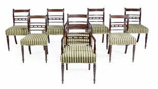 A set of eight George III mahogany dining chairs, circa 1780, including a pair of armchairs, each