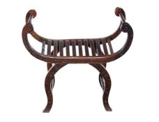 An Anglo-Chinese hardwood X-frame stool, late 19th/early 20th century, the slatted seat flanked by