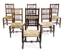 A matched set of twelve ladderback chairs, 19th century, including a pair of armchairs, each with