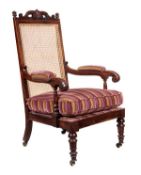 A William IV simulated rosewood armchair, circa 1835, the rectangular back with twin pierced scroll