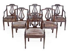 A set of six mahogany elbow chairs, in George III style, late 19th/early 20th century, each moulded