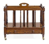 A Victorian rosewood Canterbury, circa 1840, with four slatted divisions centred by a pierced