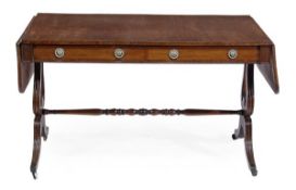 A Regency mahogany sofa table, circa 1815, the hinged rectangular top with crossbanding, above two
