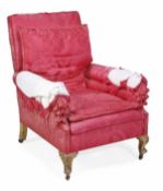 A carved giltwood and damask upholstered armchair in George II style, 18th century and later, the
