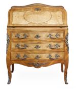 A walnut and amboyna bureau in Louis XV style, late 19th/early 20th century, with a fall front