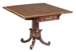 A George IV mahogany and amboyna banded Pembroke table, circa 1825, the rectangular top
