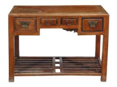 A Chinese elm side table, with four frieze drawers, on square supports above slatted undertier,