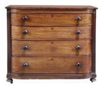 A George IV mahogany breakfront chest of drawers, circa 1825, the shaped top above four long