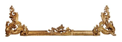 A gilt metal adjustable fender in Louis XV style, late 19th century, the rail with foliate cast