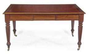 A Victorian mahogany tooled leather partnerÕs writing table, circa 1860, each side with three