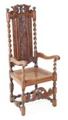 A carved oak and canework armchair in Jacobean style, elements late 17th century and later, the