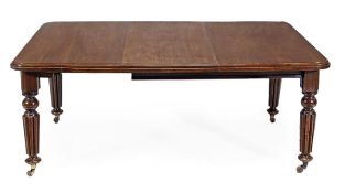 A Victorian mahogany extending dining table with an additional leaf insertion, circa 1860, the