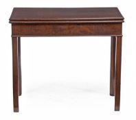 A George III mahogany folding card table, circa 1780, the rectangular top with moulded edge,