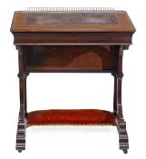 A Victorian mahogany and leather inset writing table, stamped HOWARD & SON, circa 1860,with a