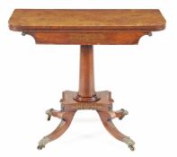 A Regency rosewood and brass marquetry folding card table, circa 1815, the D shaped top above a