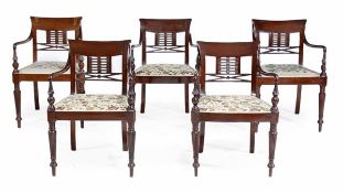 A set of ten Colonial hardwood armchairs in George IV style, each shaped rectangular back with