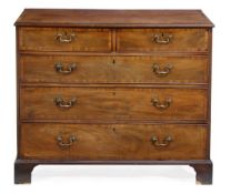 A George III mahogany straightfronted chest of drawers, circa 1780, the rectangular top above two