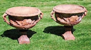 A pair of Edwardian terracotta garden urns modelled after the Warwick Vase, early 20th century, by J