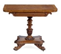 A George IV pollard oak card table, circa 1825, the D shaped top with crossbanding, opening to a