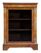 A Victorian walnut and marquetry pier cabinet, circa 1870, the rectangular top and foliate