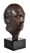 English 20th century school, a patinated bronze portrait bust of a gentleman, reputedly H.W.O.
