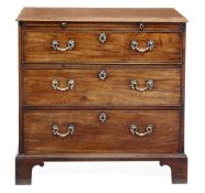A George III mahogany chest of drawers, circa 1780, the moulded rectangular top above a brushing