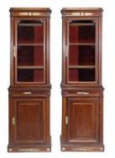 A pair of French mahogany and gilt metal mounted cabinet bookcases in Empire style, circa 1890,