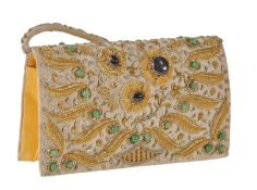 An Indian gold thread and semi-precious stone embroidered cream satin handbag, the leaf motifs set