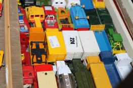 A collection of approximately 200 loose, play/worn, Matchbox diecast model cars, trucks, cement