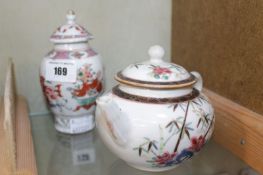 A small Famille Rose and bamboo decorated teapot, together with a small Famille Rose baluster vase