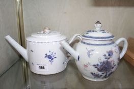 A Chinese export porcelain teapot with entwined strap handles ending in floral sprays, blue