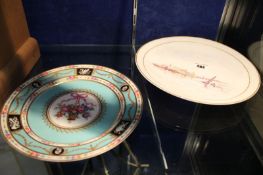 A Sevres style turquoise ground cabinet plate decorated with central floral panel and a border