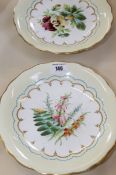 A 19th century semi-porcelain dessert service decorated with painted central floral studies