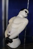 A rare Swineside Ceramics model of Freddie Mercury; 30cm high Best Bid