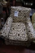 A late Victorian upholstered armchair Best Bid